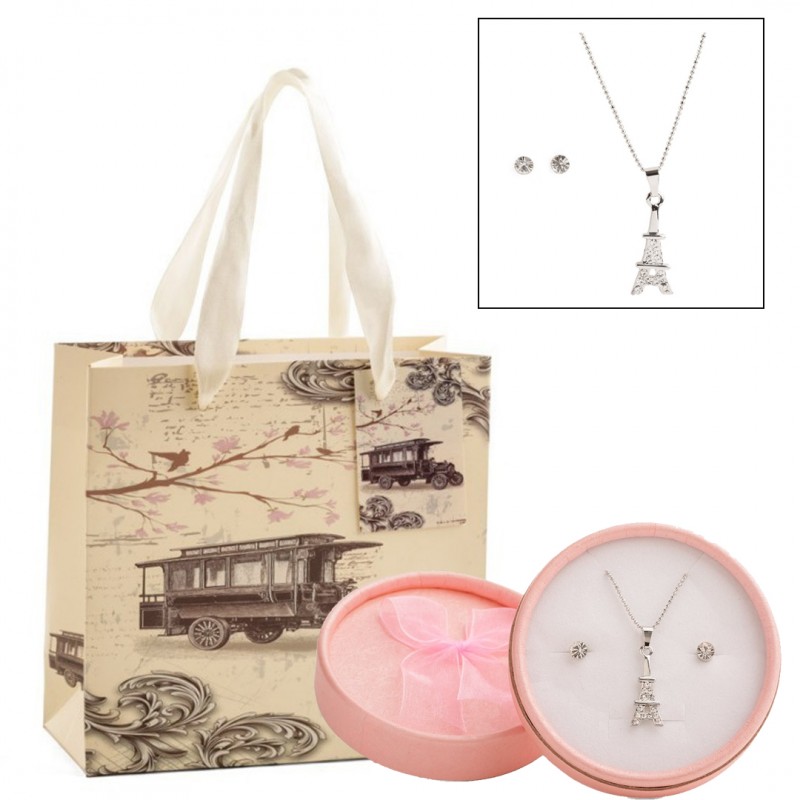 Cadena Con Colgante Torre Eiffel Y Pendientes En Cajita Rosa Presentado En Bolsa De Cartón Cadena Con Colgante Torre Eiffel Y Pendientes En Cajita Rosa Presentado En Bolsa De Cartón