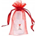 Gel hidroalcohólico con adhesivo personalizado presentado en bolsa de organza