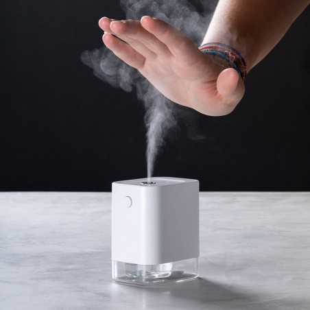 Dispensador automático higiénico de alcohol con sensor de movimiento