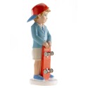 Figura de tarta niño comunión con gorra y patinete