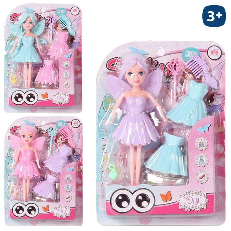 Muñeca con vestidos intercambiables sale