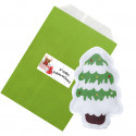 Calientamanos de bolsillo en forma de árbol de navidad presentado en sobre verde con adhesivo navideño