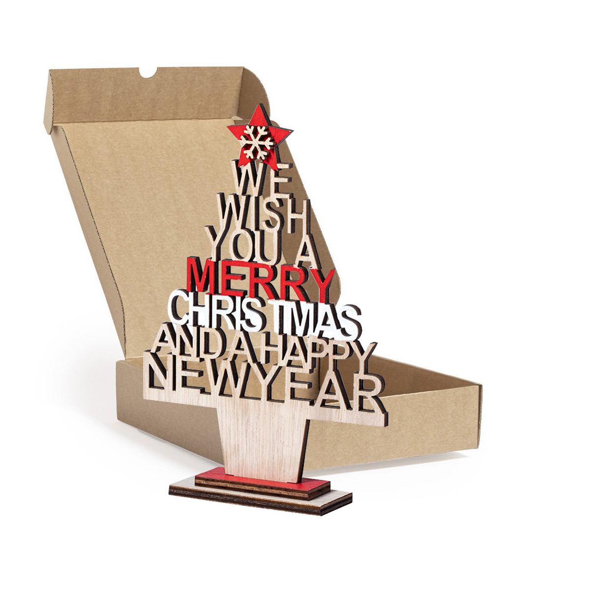 Arbolito de navidad pequeño sobre mesa presentado en caja de cartón cuadrada