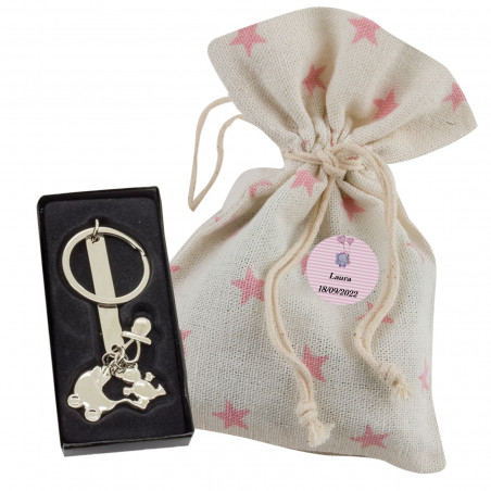 Llavero con charmings de bebe en bolsa rústica con estrellas rosas y adhesivo personalizado