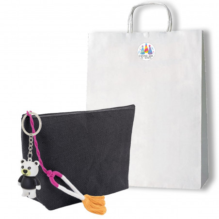 Neceser con borla y con llavero de oso en bolsa con adhesivo de regalo