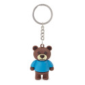 Llavero en forma de oso presentado en bolsita de tela con adhesivo personalizable de bautizo