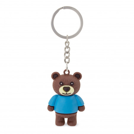 Llavero en forma de oso presentado en bolsita de tela con adhesivo personalizable de bautizo