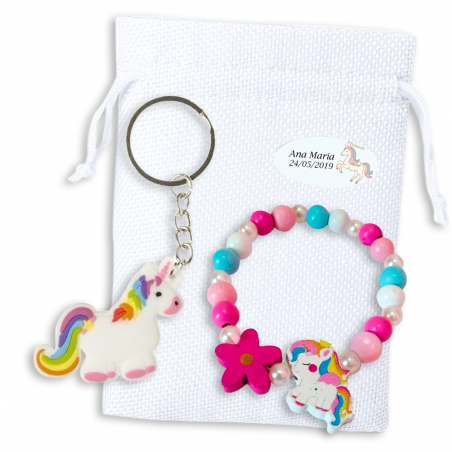 Pulsera y llavero de unicornio en bolsa de tela blanca con adhesivo personalizado