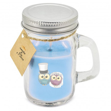 Vela en jarra de cristal en color azul con adhesivo personalizado y decoración para bodas