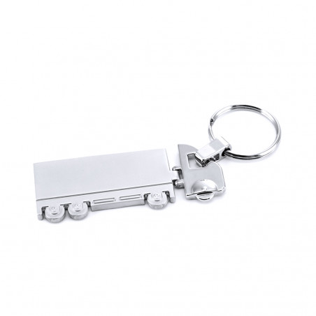 Llavero en forma de trailer presentado en bolsa de acetato