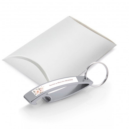 Llavero abridor con adhesivo flores presentado en caja para detalles+