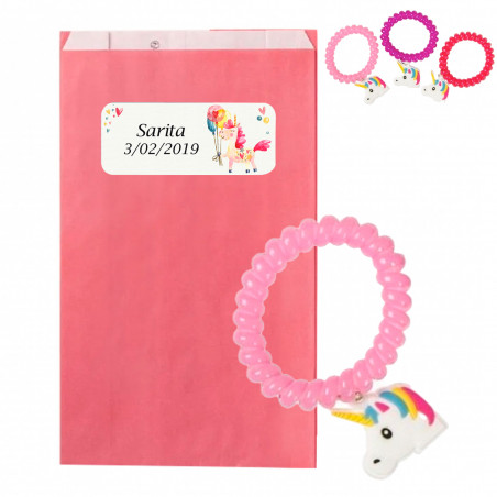 Pulsera unicornio en sobre kraft rosa con adhesivo personalizable para regalar