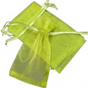 Vela aromática en lata personalizada con adhesivo y presentada en bolsa de organza