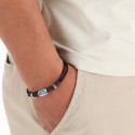 Pulsera de piel con el símbolo de la paz presentada con sobre para bautizo