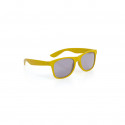 Gafas de sol amarillas infantil y pelota de playa con mochila de pato