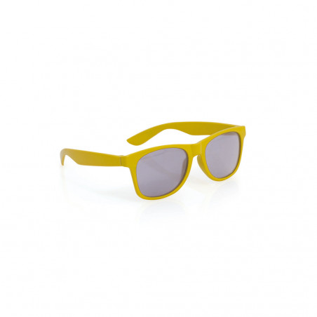 Gafas de sol amarillas infantil y pelota de playa con mochila de pato