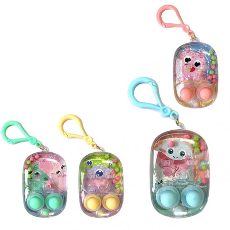 Juego de habilidad con agua diseño de monstruos y mosquetón en bolsa rosa y adhesivo de cumpleaños personalizado